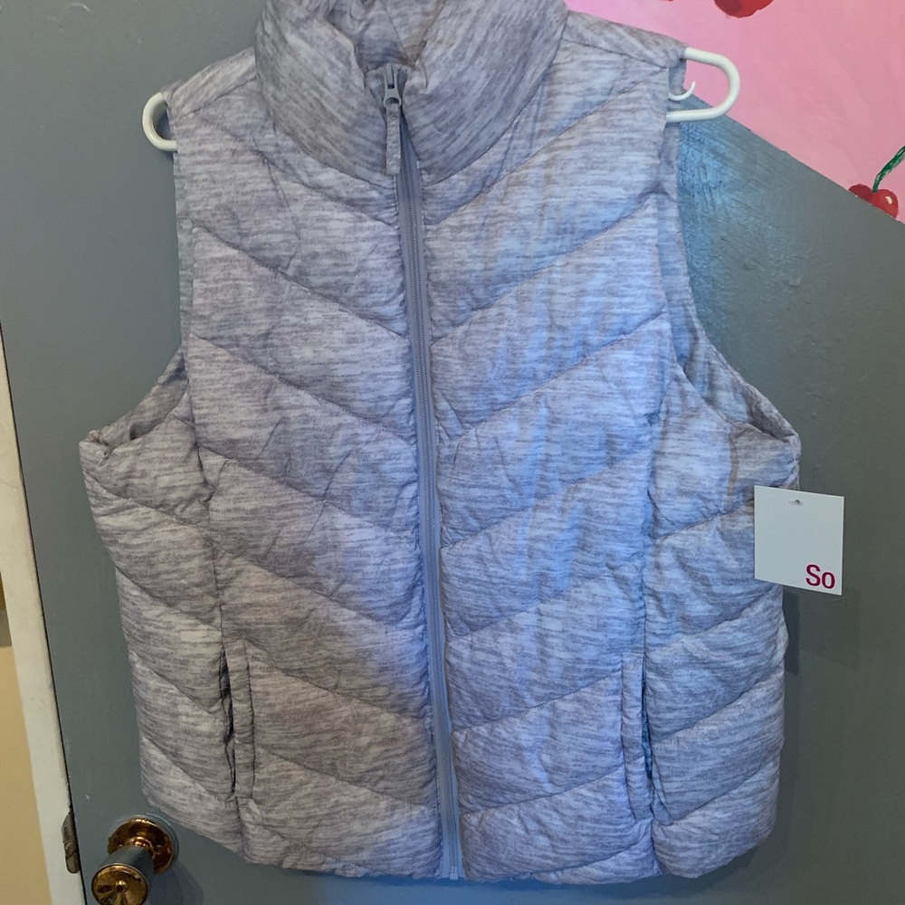 grey puffer vest.